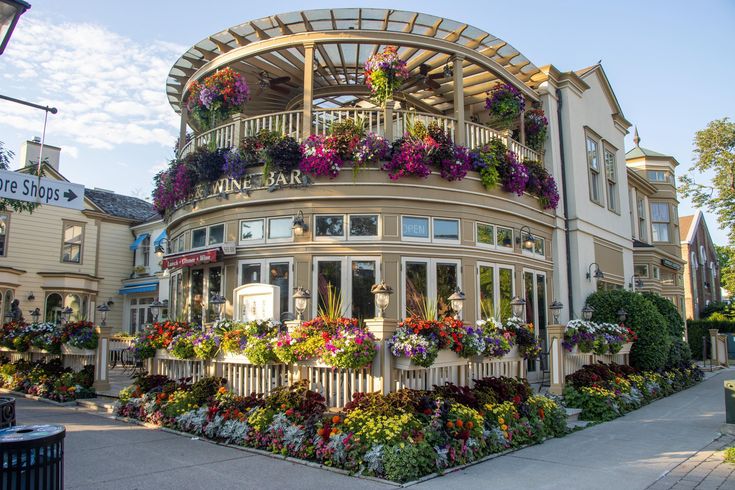 Round building with floral decorations on a street corner